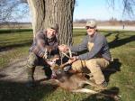 Bob shakes hands with Jason at the end of his hunt with buck in hand